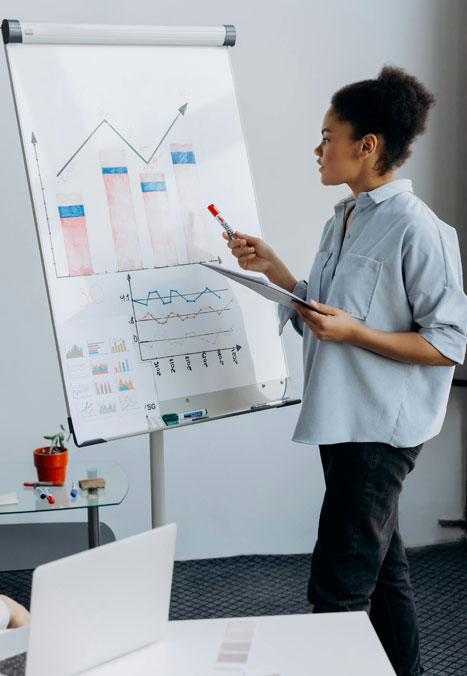 woman showing marketing stats